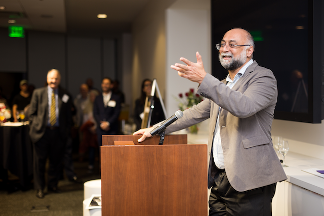 Professor Amir Hussain lecturing at podium